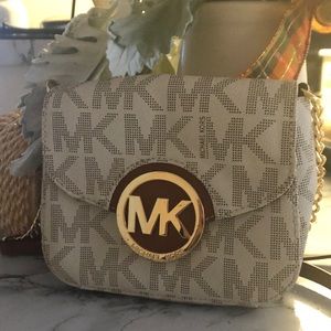Micheal Kores crossbody purse .